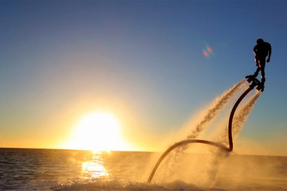Watersports flyboard sunset